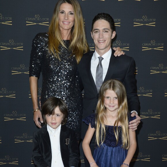 Sophie Thalmann, son mari Christophe Soumillon et leur enfants Charlie et Mika - 65e édition des Cravaches d'Or au Théâtre des Champs-Elysées à Paris le 14 mars 2014.