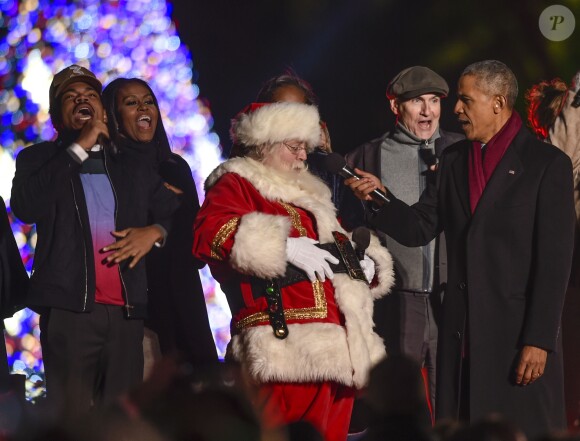 Barack Obama, Michelle Obama, le père Noël et Chance The Rapper à Washington. Le 1er décembre 2016.