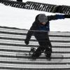Maddox Jolie-Pitt fait du snowboard dans le Colorado, le 28 décembre 2016.