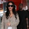 Pascal Duvier (garde du corps) escorte Kim Kardashian et son mari Kanye West quittent Paris pour Los Angeles à l'aéroport de Roissy-Charles-de-Gaulle le 14 juin 2016.