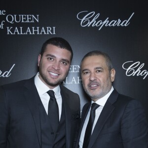 Semi-Exclusif - Elie Saab et son fils Elie Saab Jr lors du photocall de la présentation de la collection Chopard ''The Queen of Kalahari'' au théâtre du Châtelet à Paris, le 21 janvier 2017.