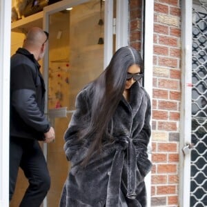 Kim Kardashian a déjeuné au restaurant Cipriani avec ses enfants North, Saint West et ses amis Jonathan Cheban et Simon Huck, puis fait du shopping au magasin de vêtements pour enfants Sweet William et au centre commercial Bergdorf Goodman. New York, le 1 er février 2017.