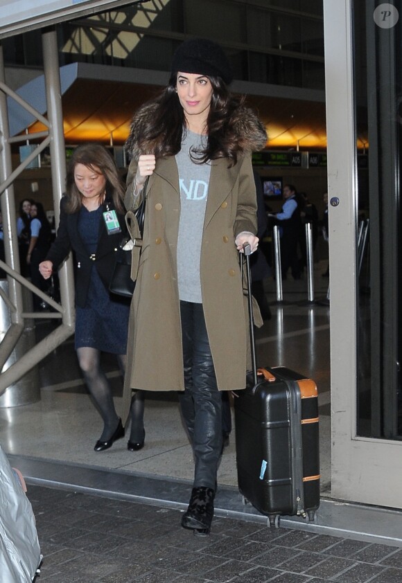 George Clooney et Amal Clooney arrivent à l'aéroport de Los Angeles le 27 janvier 2017