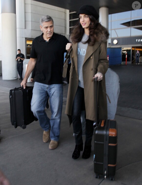 George Clooney et Amal Clooney arrivent à l'aéroport de Los Angeles le 27 janvier 2017