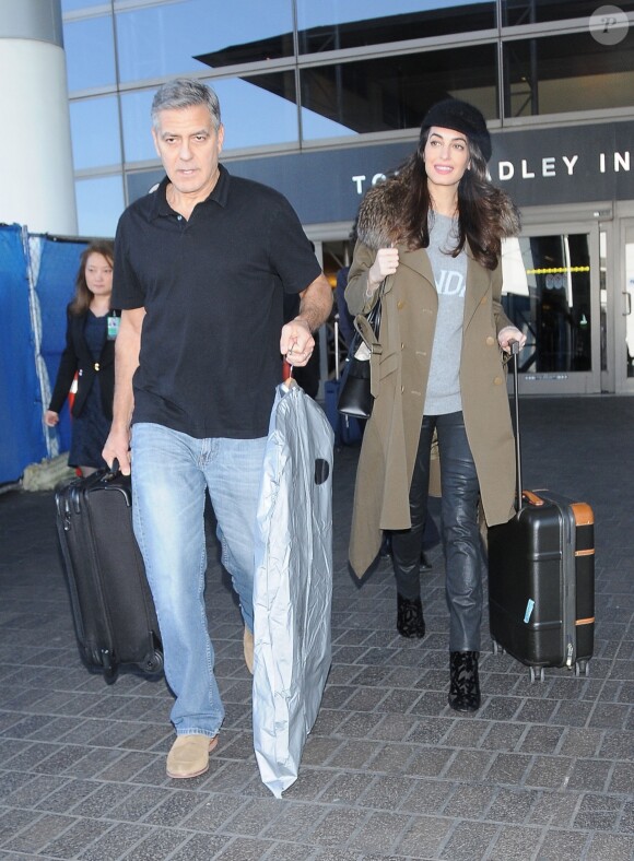 George Clooney et Amal Clooney arrivent à l'aéroport de Los Angeles le 27 janvier 2017