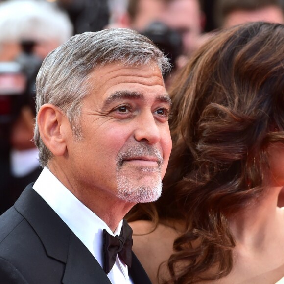 George Clooney et sa femme Amal Alamuddin Clooney (bijoux Cartier) - Montée des marches du film "Money Monster" lors du 69e Festival International du Film de Cannes. Le 12 mai 2016. © Giancarlo Gorassini/Bestimage