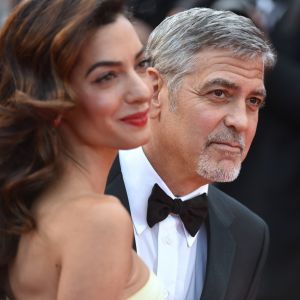 George Clooney et sa femme Amal Alamuddin Clooney (bijoux Cartier) - Montée des marches du film "Money Monster" lors du 69e Festival International du Film de Cannes. Le 12 mai 2016. © Giancarlo Gorassini/Bestimage