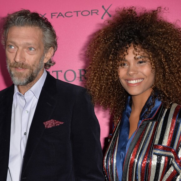 Vincent Cassel et sa compagne Tina Kunakey lors du photocall du Victoria's Secret Fashion 2016 au Grand Palais à Paris, France, le 30novembre 2016. © BOV/Bestimage
