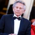 Roman Polanski et sa femme Emmanuelle Seigner lors de la montée des marches pour la projection de La Venus à la fourrure au 66e Festival de Cannes, en mai 2013