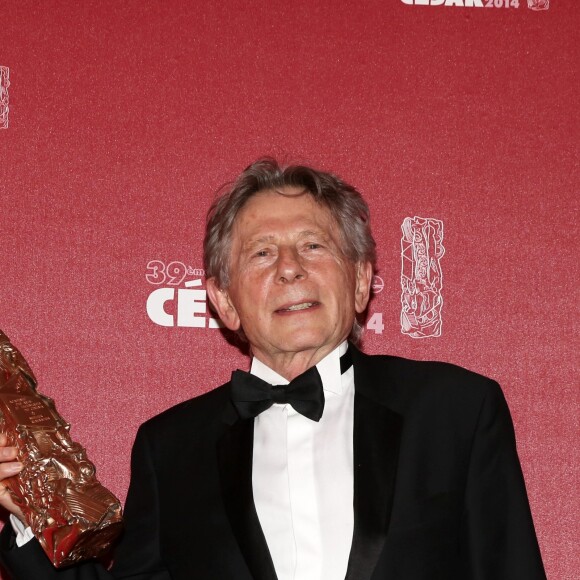Roman Polanski avec le Cesar du meilleur réalisateur pour le film "La Vénus à la fourrure" au théâtre du Châtelet à Paris le 28 février 2014.