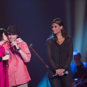 MAURANE TATIANA SILVA & CARLO ( adolescent bresilien, atteint d'une leucemie, qui realise son reve en chantant devant des milliers de gens la chanson " nossa nossa asi noce me mata " )- Concert Des Reves et des Etoiles - Make a Wish 2012 - Soiree qui realise les reves d'enfants malades, avec la participation de nombreuses personnalites. Bruxelles, Palais du Heysel, 14 decembre 2012.14/12/2012 - Bruxelles