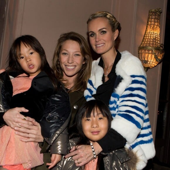 Exclusif - Laura Smet, Laeticia Hallyday et ses filles Jade et Joy - Aftershow apres le concert caritatif de Johnny Hallyday pour l'association de sa femme "La Bonne Etoile", qui vient en aide aux enfants du Vietnam, au Trianon a Paris, le 15 decembre 2013.