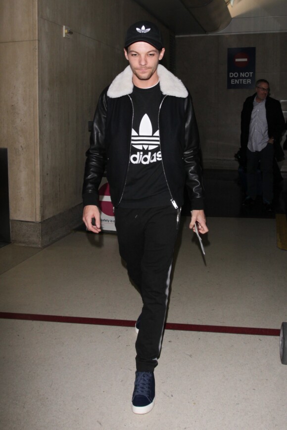 Louis Tomlinson arrive à l'aéroport de Los Angeles (LAX), le 27 Janvier 2017.