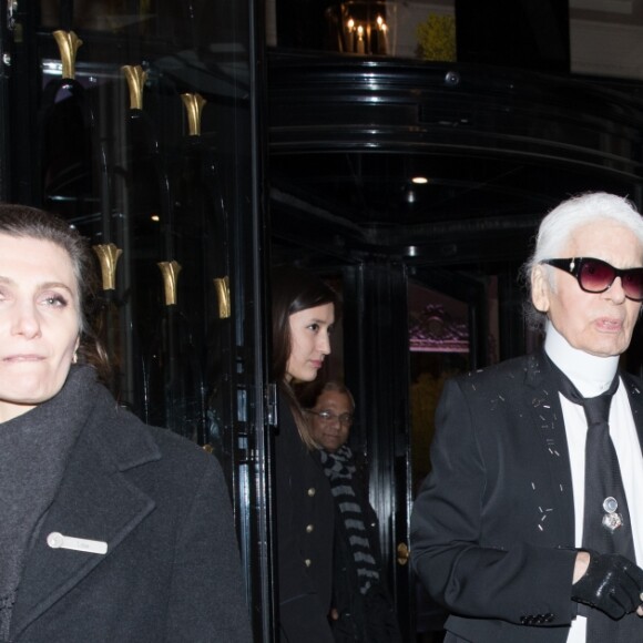 Karl Lagerfeld et son assistant Sébastien Jondeau à la soirée du magazine CR Fashion Week à l'hôtel Four Seasons George V à Paris, le 4 mars 2017.