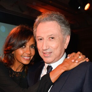 Karine Le Marchand et Michel Drucker - Dîner de gala de la première édition des prix "les Stéthos d'Or" en faveur de la Fondation pour la recherche en physiologie dont le docteur Frédéric Saldmann est le directeur scientifique à l'hôtel George V à Paris le 13 mars 2017. © Coadic Guirec/Bestimage