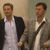 Le prêtre polonais Krzysztof Olaf Charamsa (à gauche) et son compagnon Eduardo Planas arrivent à Barcelone en Espagne le 5 octobre 2015.