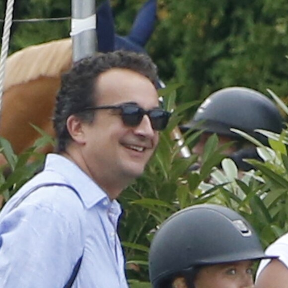 Olivier Sarkozy encourage sa femme Mary-Kate Olsen lors du jumping "Hampton Classic Horse Show " à Bridgehampton près de New York le 1er septembre 2016.