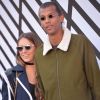 Stromae, se laisse pousser les cheveux, et sa femme Coralie Barbier - People sortant du défilé de mode "Louis Vuitton", collection prêt-à-porter Printemps-Eté 2017 à Paris, le 5 octobre 2016.