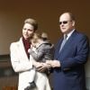 La princesse Charlène de Monaco, son mari le prince Albert II de Monaco et leur fille la princesse Gabriella de Monaco - 7ème édition du tournoi de rugby Sainte-Dévote au Stade Louis II à Monaco, le 18 mars 2017. © Claudia Albuquerque/Bestimage