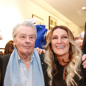 Exclusif - Anthony Delon avec son père Alain Delon et Liliane Jossua (directrice du Montaigne Market) - Lancement de la marque de vêtements de cuir "Anthony Delon 1985" chez Montaigne Market à Paris. Le 7 mars 2017 © Philippe Doignon / Bestimage