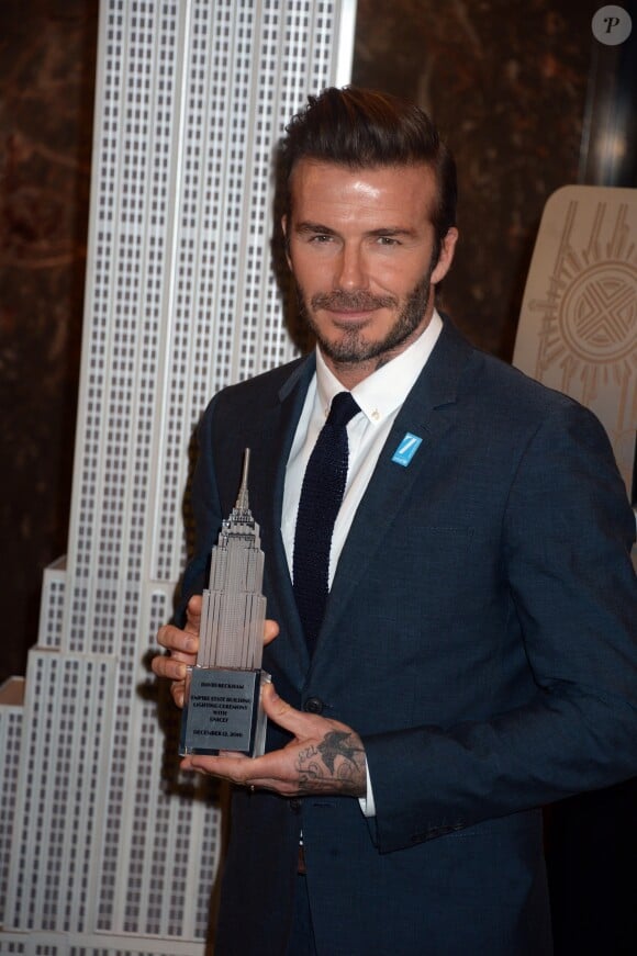 David Beckham, ambassadeur de bonne volonté de l'UNICEF illumine l'Empire State Building pour les 70 ans de l'UNICEF le 12 décembre 2016.