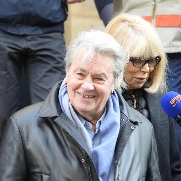 Alain Delon et Mireille Darc - Hommage à Georges Lautner en l'église Saint-Roch à Paris. Le 5 decembre 2013