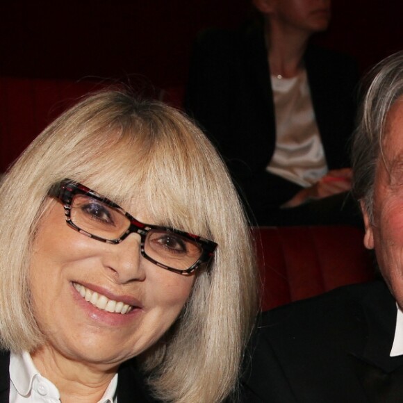Alain Delon et Mireille Darc lors du gala de l'IFRAD à Paris, le 18 septembre 2013.
