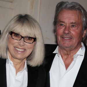 Alain Delon et Mireille Darc lors du gala de l'IFRAD à Paris, le 18 septembre 2013.