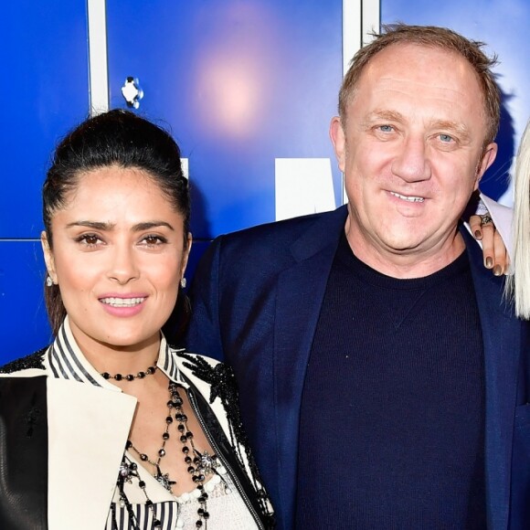 Salma Hayek, son mari Francois-Henri Pinault et Cara Delevingne - Photocall avant le défilé Fenty Puma by Rihanna à la Bibliothèque Nationale à Paris le 6 mars 2017