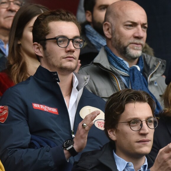 Louis Sarkozy avec une amie, Jean Sarkozy et Pierre Sarkozy - Célébrités dans les tribunes du parc des princes lors du match de football de ligue 1 PSG-Bastia le 6 mai 2017.