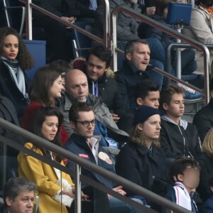 Louis Sarkozy avec une amie, Pierre Sarkozy, Jean Sarkozy et son fils Solal, Cécile de Ménibus avec son compagnon Thierry - Célébrités dans les tribunes du parc des princes lors du match de football de ligue 1 PSG-Bastia le 6 mai 2017.