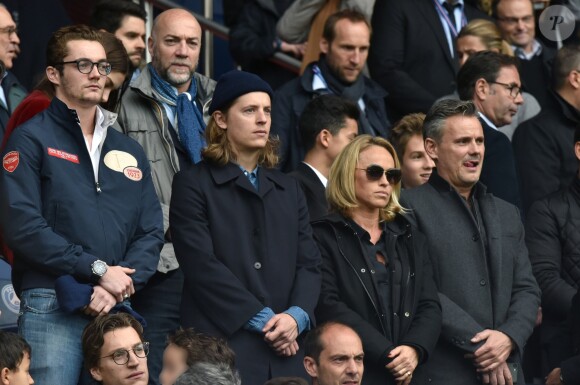 Louis Sarkozy, Jean Sarkozy et son fils Solal, Pierre Sarkozy, Cécile de Ménibus avec son compagnon Thierry - Célébrités dans les tribunes du parc des princes lors du match de football de Ligue 1 PSG-Bastia le 6 mai 2017.
