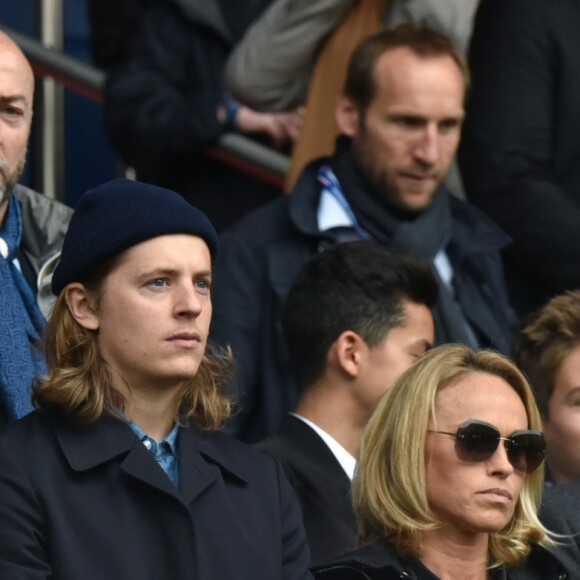 Louis Sarkozy, Jean Sarkozy et son fils Solal, Pierre Sarkozy, Cécile de Ménibus avec son compagnon Thierry - Célébrités dans les tribunes du parc des princes lors du match de football de Ligue 1 PSG-Bastia le 6 mai 2017.