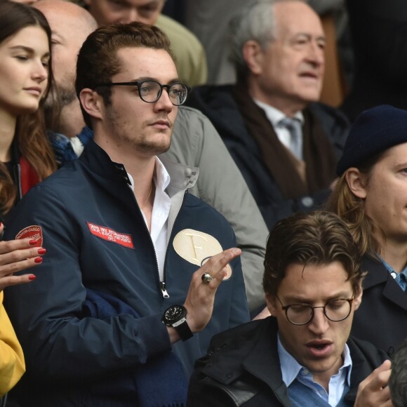 Louis Sarkozy avec une amie, Jean Sarkozy et Pierre Sarkozy - Célébrités dans les tribunes du parc des princes lors du match de football de ligue 1 PSG-Bastia le 6 mai 2017.