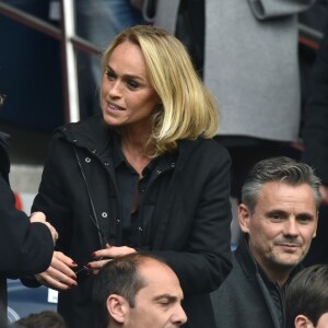 Jean Sarkozy avec Cécile de Ménibus et son compagnon Thierry - Célébrités dans les tribunes du parc des princes lors du match de football de ligue 1 PSG-Bastia le 6 mai 2017.