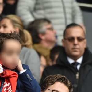 Jean Sarkozy et son fils Solal - Célébrités dans les tribunes du parc des princes lors du match de football de ligue 1 PSG-Bastia le 6 mai 2017.