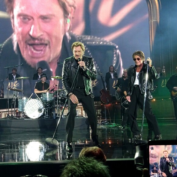 Eddy Mitchell, Johnny Hallyday et Jacques Dutronc lors du Premier concert "Les Vieilles Canailles" au POPB de Paris-Bercy à Paris, du 5 au 10 novembre 2014.