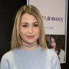 EnjoyPhoenix (Marie Lopez) dédicace son livre "Carnet de routes" à la foire du livre de Bruxelles, Belgique, le 10 mars 2017.