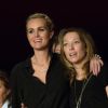 Exclusif - Laeticia Hallyday et Laura Smet - Aftershow après le concert caritatif de Johnny Hallyday pour l'association de sa femme "La Bonne Etoile", qui vient en aide aux enfants du Vietnam, au Trianon à Paris, le 15 décembre 2013.