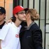 Céline Dion et son fils René-Charles Angelil sortent de l'hôtel Royal Monceau à Paris le 7 juillet 2017.