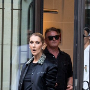 Céline Dion et son fils René-Charles Angelil sortent de l'hôtel Royal Monceau à Paris le 7 juillet 2017.