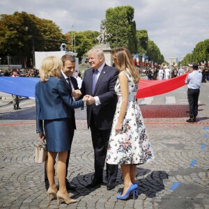 Le président de la République Emmanuel Macron, sa femme Brigitte Macron (Trogneux), le président des Etats-Unis Donald Trump et sa femme Melania Trump lors du défilé du 14 juillet (fête nationale), place de la Concorde, à Paris, le 14 juillet 2017, avec comme invité d'honneur le président des Etats-Unis. © Denis Allard/Pool/Bestimage