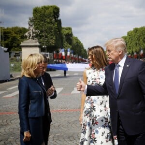 Le président de la République Emmanuel Macron, sa femme Brigitte Macron (Trogneux), le président des Etats-Unis Donald Trump et sa femme Melania Trump lors du défilé du 14 juillet (fête nationale), place de la Concorde, à Paris, le 14 juillet 2017, avec comme invité d'honneur le président des Etats-Unis. © Denis Allard/Pool/Bestimage