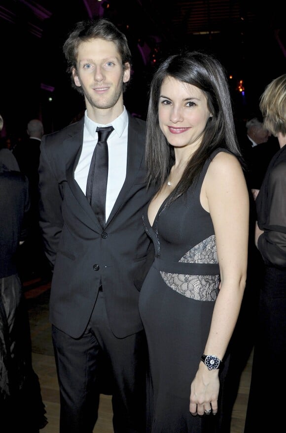 Romain Grosjean et sa femme Marion Jolles enceinte - Diner de Gala du 92eme Grand Prix d' Amerique au Grand Palais a Paris le 26 Janvier 2013.