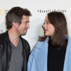 Marion Cotillard et Guillaume Canet - Avant première du documentaire "Before the flood" au théâtre du Chatelet à Paris le 17 octobre 2016. © Cyril Moreau/Bestimage