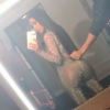 Photo de Kim Kardashian, en haut et legging Gucci. Août 2017.