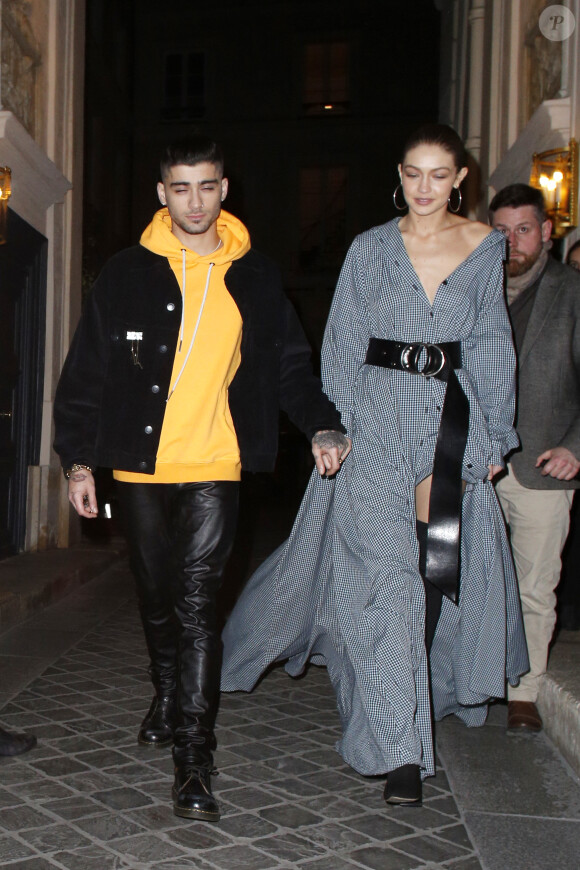 Gigi Hadid et son compagnon Zayn Malik quittent un restaurant et rentrent à l'hôtel George V à Paris le 3 mars 2017.