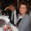 Bernard Tapie avec sa fille Sophier et sa femme Dominique lors d'une soirée pour les 85 ans de Michou et les 60 ans de son cabaret à Paris le 20 juin 2016.