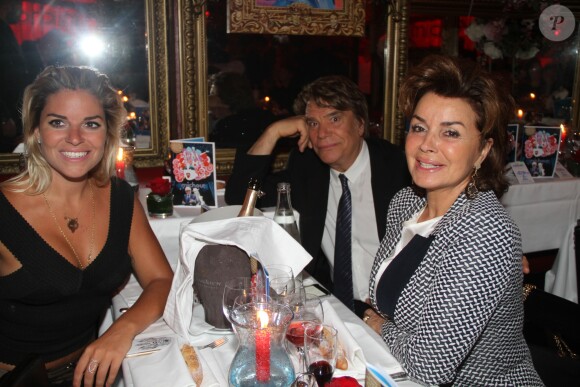 Bernard Tapie avec sa fille Sophier et sa femme Dominique lors d'une soirée pour les 85 ans de Michou et les 60 ans de son cabaret à Paris le 20 juin 2016.