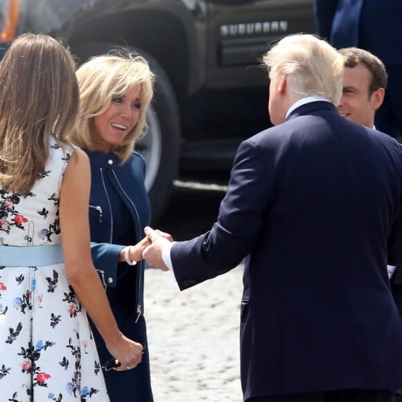 Le président de la République Emmanuel Macron, sa femme Brigitte Macron, le président des Etats-Unis Donald Trump et sa femme Melania Trump lors du défilé du 14 juillet (fête nationale), place de la Concorde, à Paris, le 14 juillet 2017 . © Dominique Jacovides/Sébastien Valiela/Bestimage